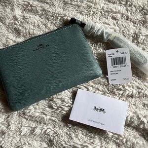 Coach light blue wristlet wallet